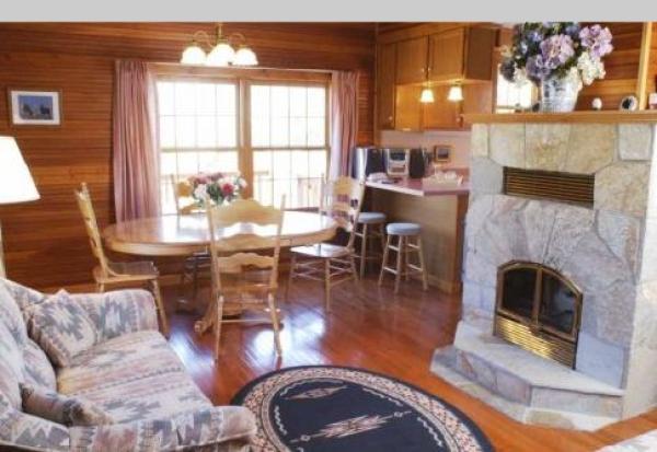 Living/dining room with wood fireplace