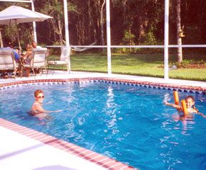 14' x 28' private heated swimming pool and furnished poolside