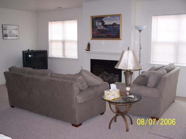 Living room w/cozy seating & fireplace