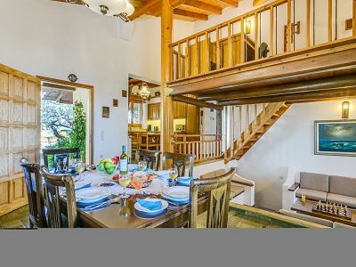 Open plan area with stairs to balcony
