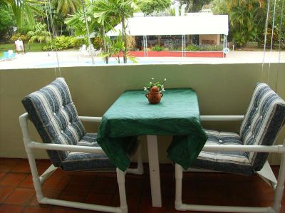 Balcony with view of pool
