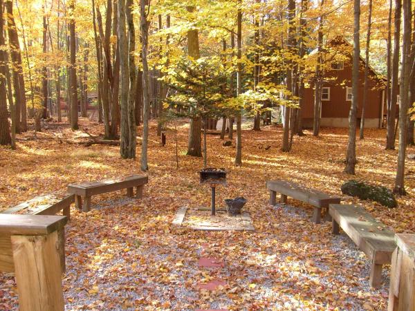 Barbeque relaxing area with benches & nature.