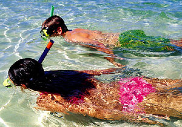 Snorkeling in warm waters of the Koro Sea