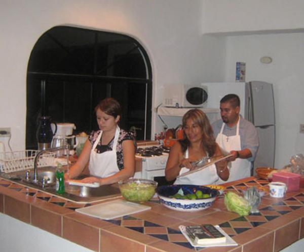 Isabel and Yeyo prepare dinner nightly 