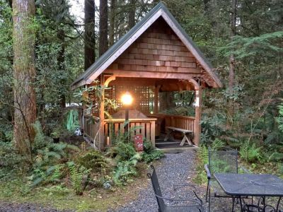 Private gazebo area with HOT TUB and a gas grill