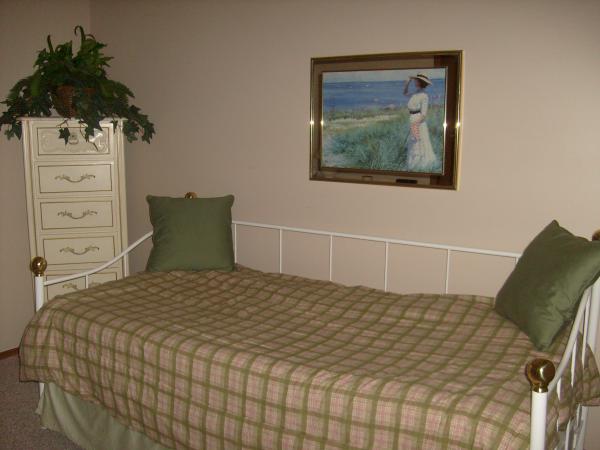 This bedroom has a day bed for 2 people's comfort.