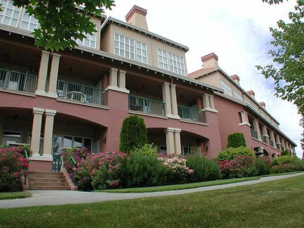 Walk way and units on East Side, golf course 