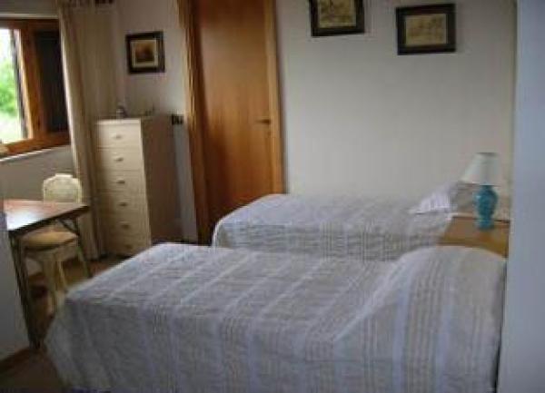 Pretty second bedroom overlooking the front garden