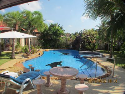 Sun loungers beside pool