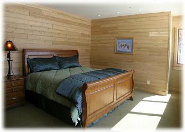 King size bed with luxury linens and bath