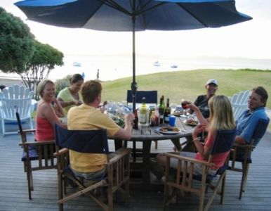 Large deck and dining area with unobstructed views