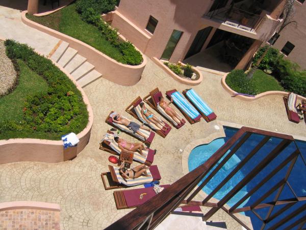 The Villa overlooks the Pool Action!