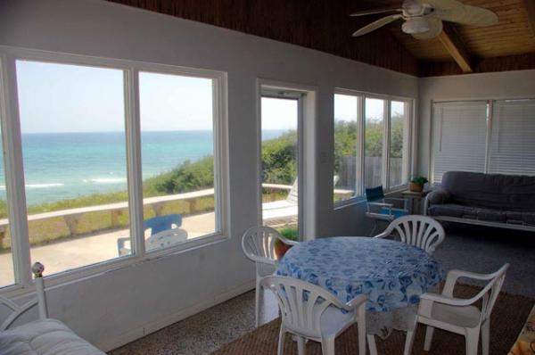 Glassed  porch serves as 3rd rm. w/ day/night beds