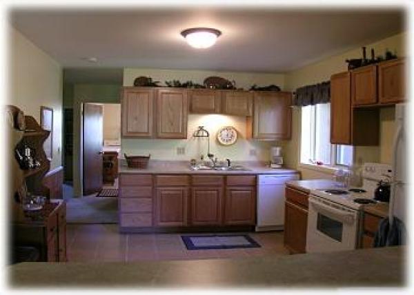 A complete kitchen with all the cookware