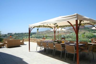 Dining area outside under shady gazebo