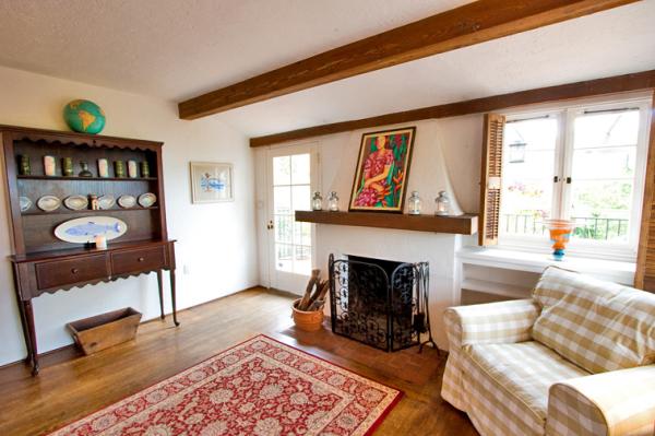 living room with fireplace and ocean view