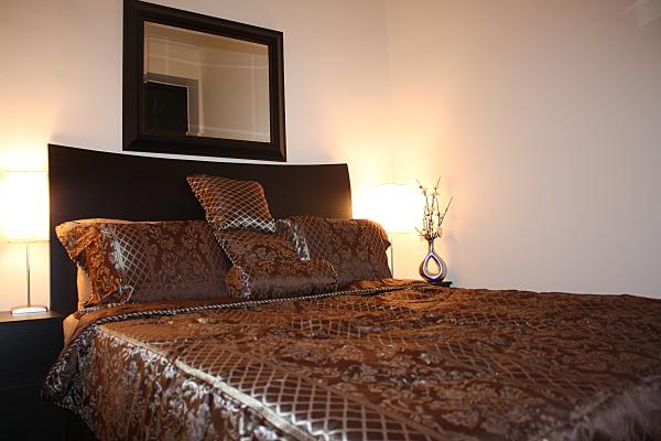 Bedroom has a Solid Mahogany Queen Size Bed G Line