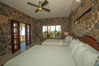 Twin bedroom with door to balcony