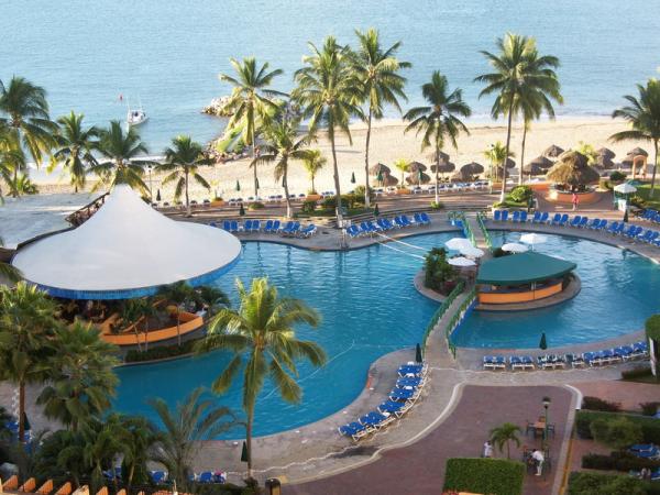 View of pool and beach from condo