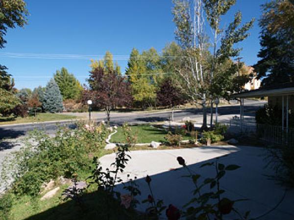 View of Park across street from front covered porc