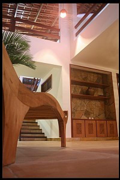 Living room with an open ceiling to the top foor