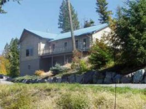 Apartment is the lower floor of this Log Home