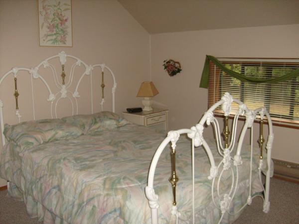Relax in a comfortable bedroom equipped with a TV.