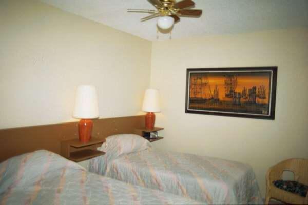 Twin beds in the second bedroom