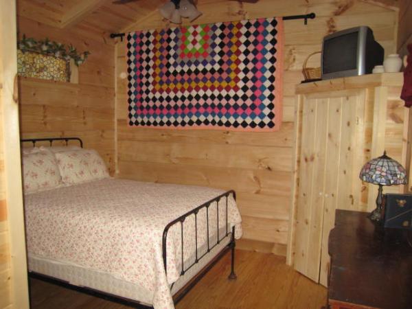 100 yr old wrought iron bed and quilt  