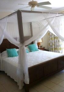 Lime Hill Villa bedroom with four poster bed