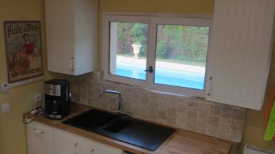 Kitchen with view of pool