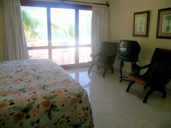 Master Bedroom with Tommy Bahama Bedding and TV.