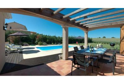 Pergola terrace with dining table and view