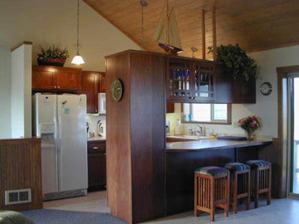 Fully Equiped Galley Kitchen and Eating Bar